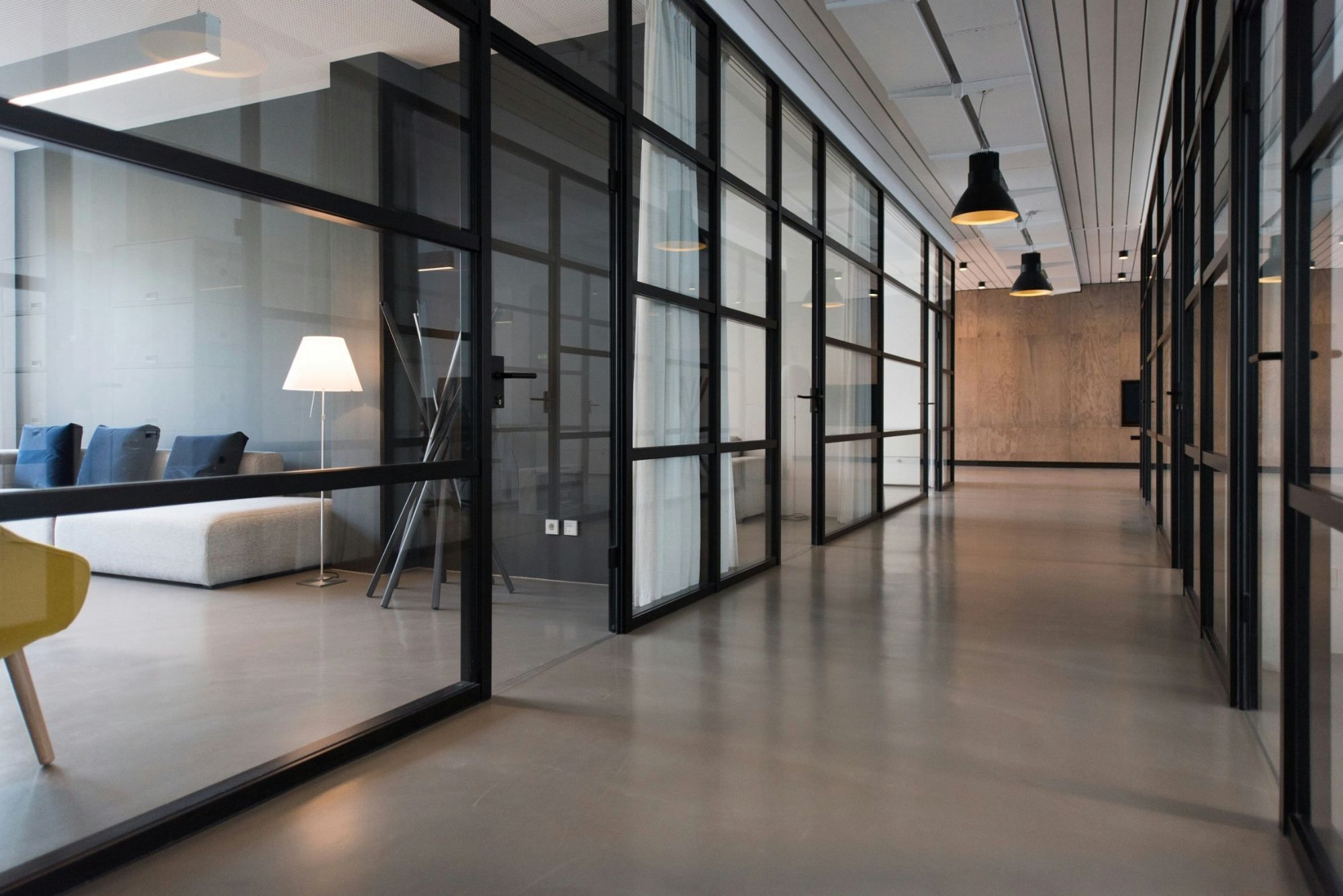 Corridor between glass-panel office doors